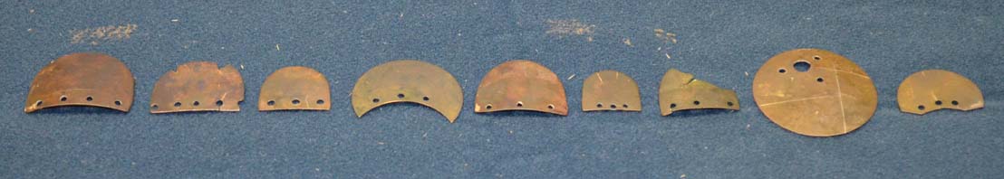 several%20pieces%20of%20brass%20flattened%20armour
